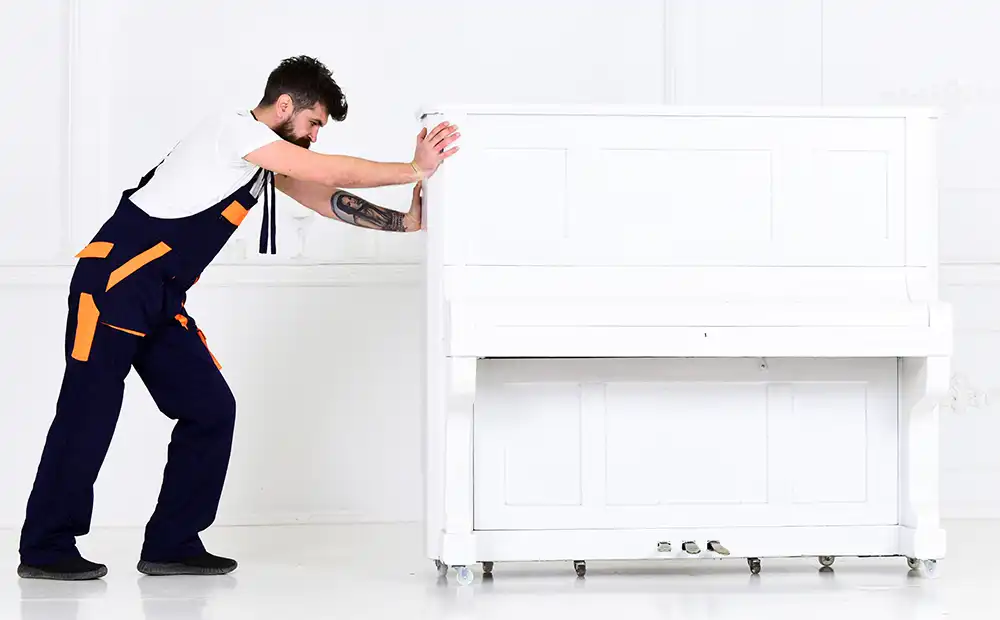 professional piano mover moving a piano in arkansas